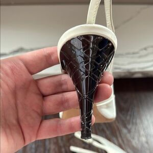 Authentic Burberry white patent leather sandals, Burberry check engraved heels.